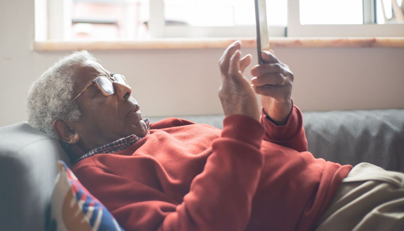 A person reading the news on a phone