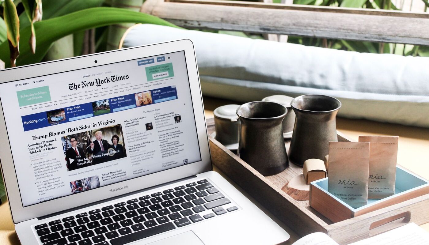 A laptop showing a news website