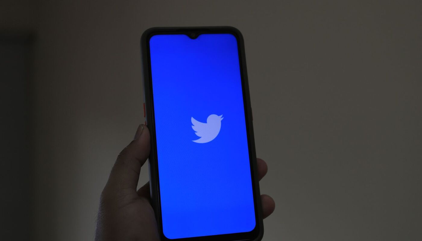 A smartphone showing a social media feed