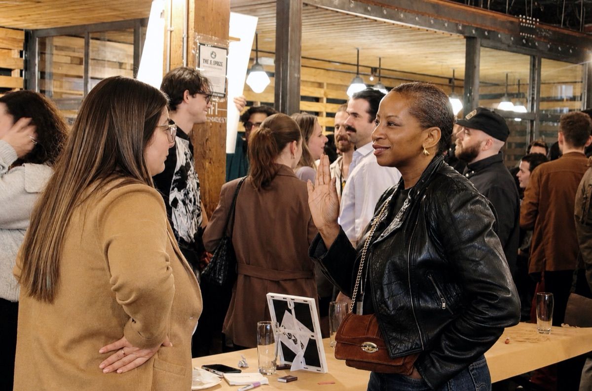 Guests talking before a Newsreel event